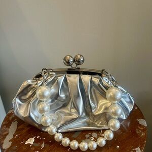 Elegant Silver Clutch with Pearl Handle